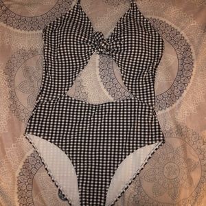 cut out swim suit. never wore. liner still on.